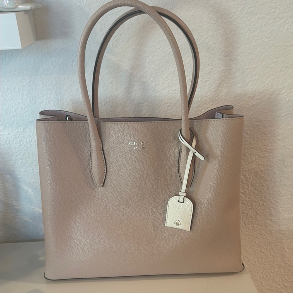 Kate Spade Cream Tote Bag with Minimalist Design